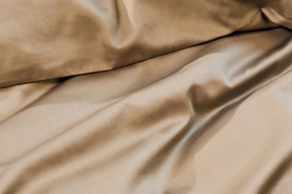 Sådan vasker og plejer du dit sengetøj - materiale for materiale